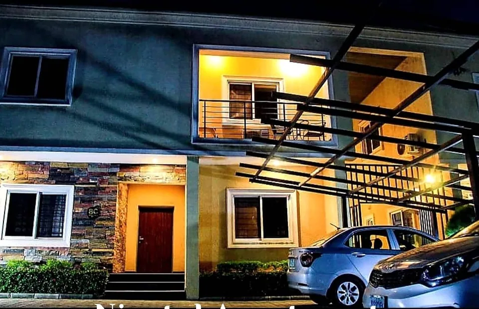 Nicotel Apartments exterior in Gudu, Abuja, photographed in the evening