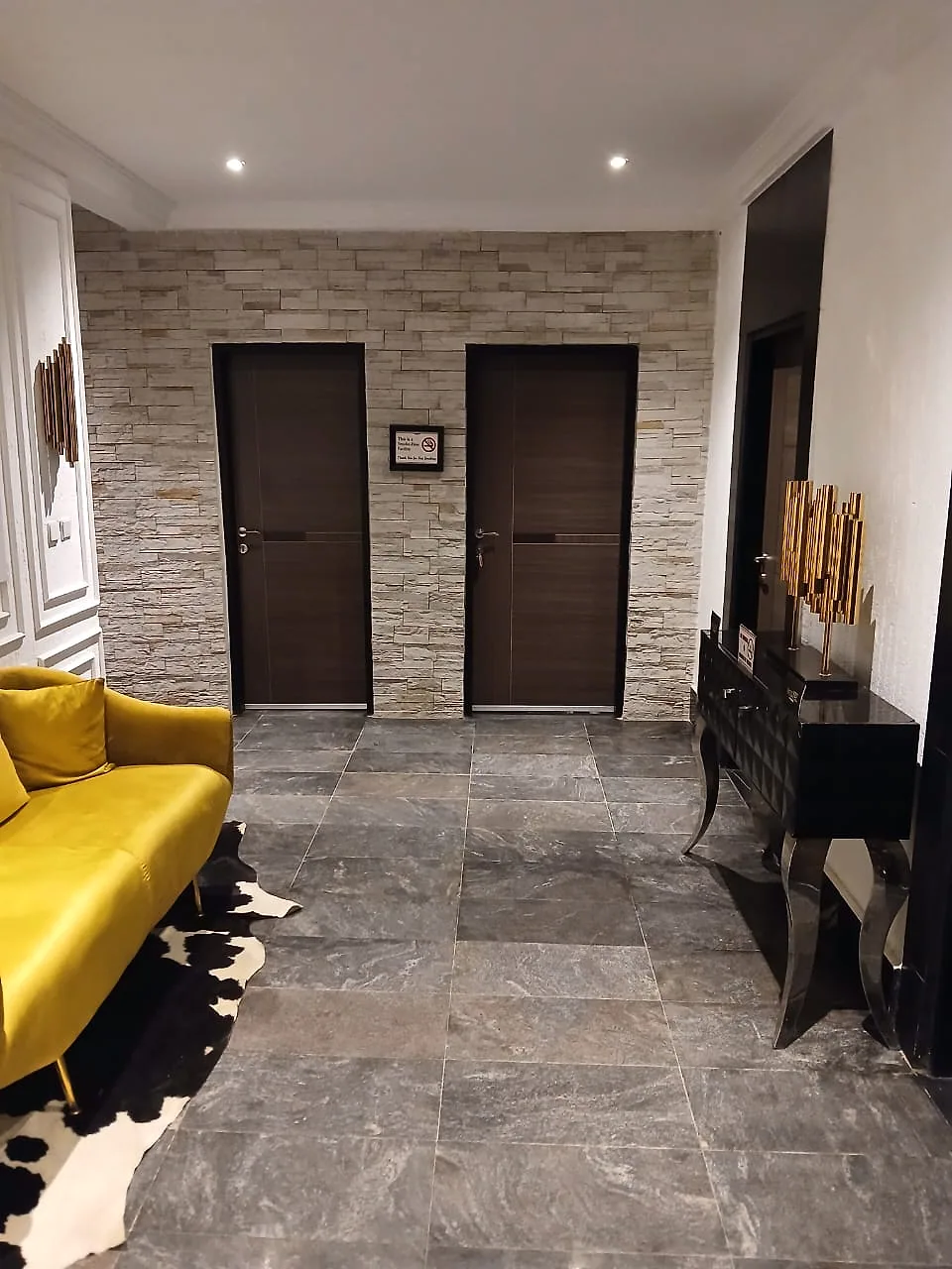 Interior seating and hallway in the Mini One-Bedroom with Kitchen category